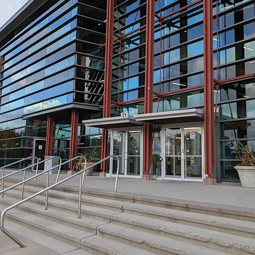 Front of the SCAET building and the front entrance to campus.
