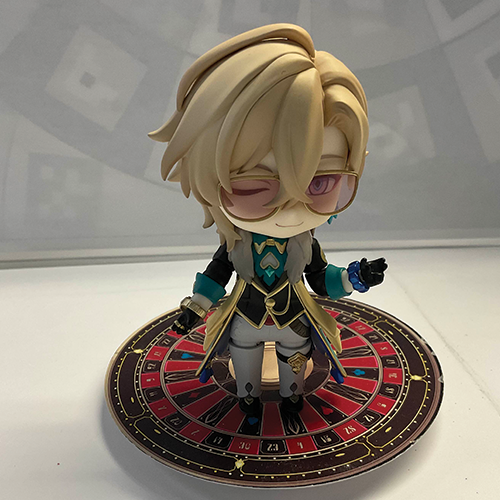 I began to take photos of all the objects I brought using the scanning paper and the desk underneath it. This particular angle I really enjoyed because of how detailed the figure of Aventurine was but I chose to take another later.