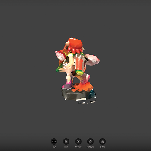 Back angle of the inkling figure in scaniverse with a distorted tank on its back.